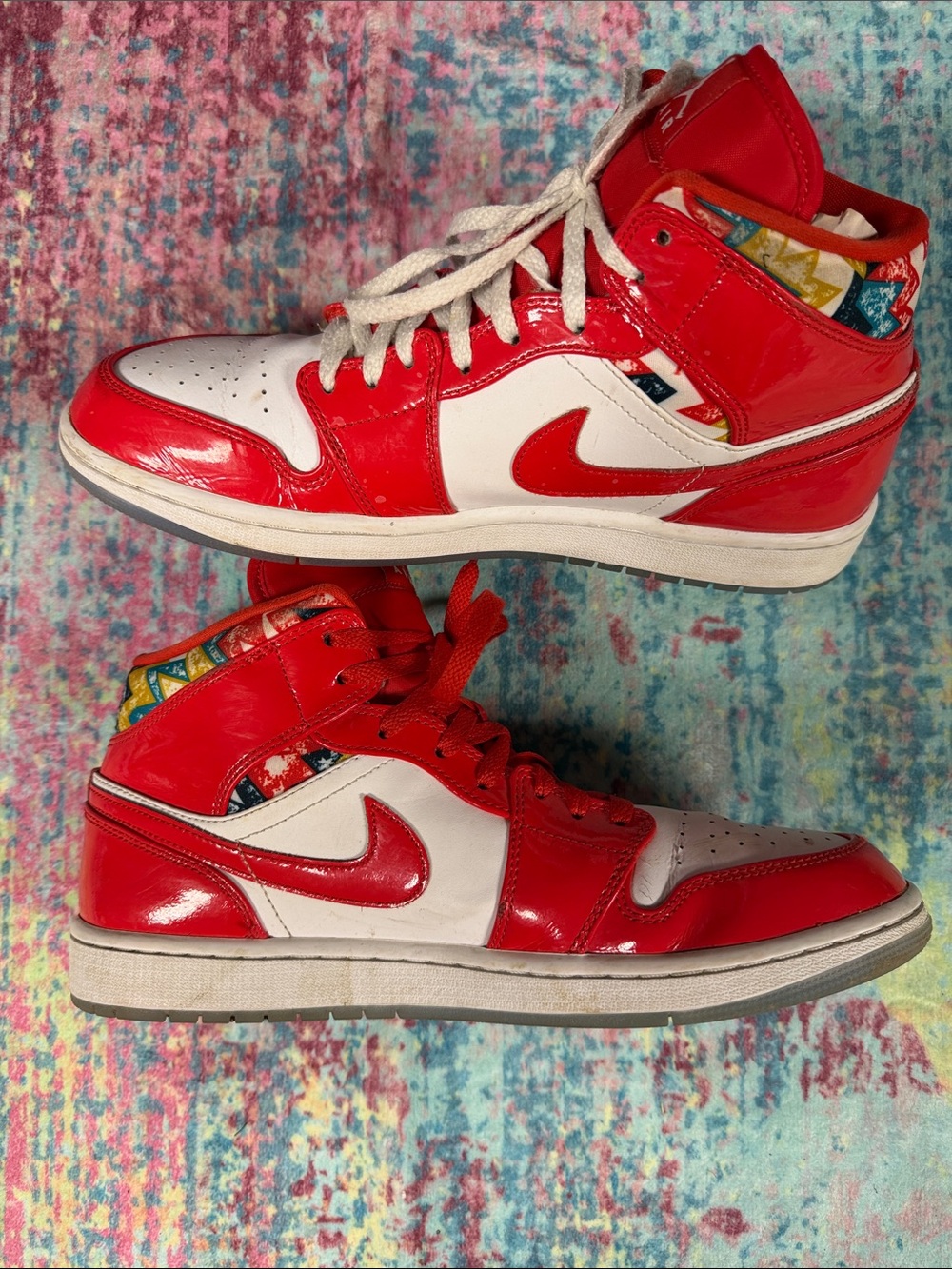 Jordan men’s High Top Sneakers in Red and White with Multicolor Collar